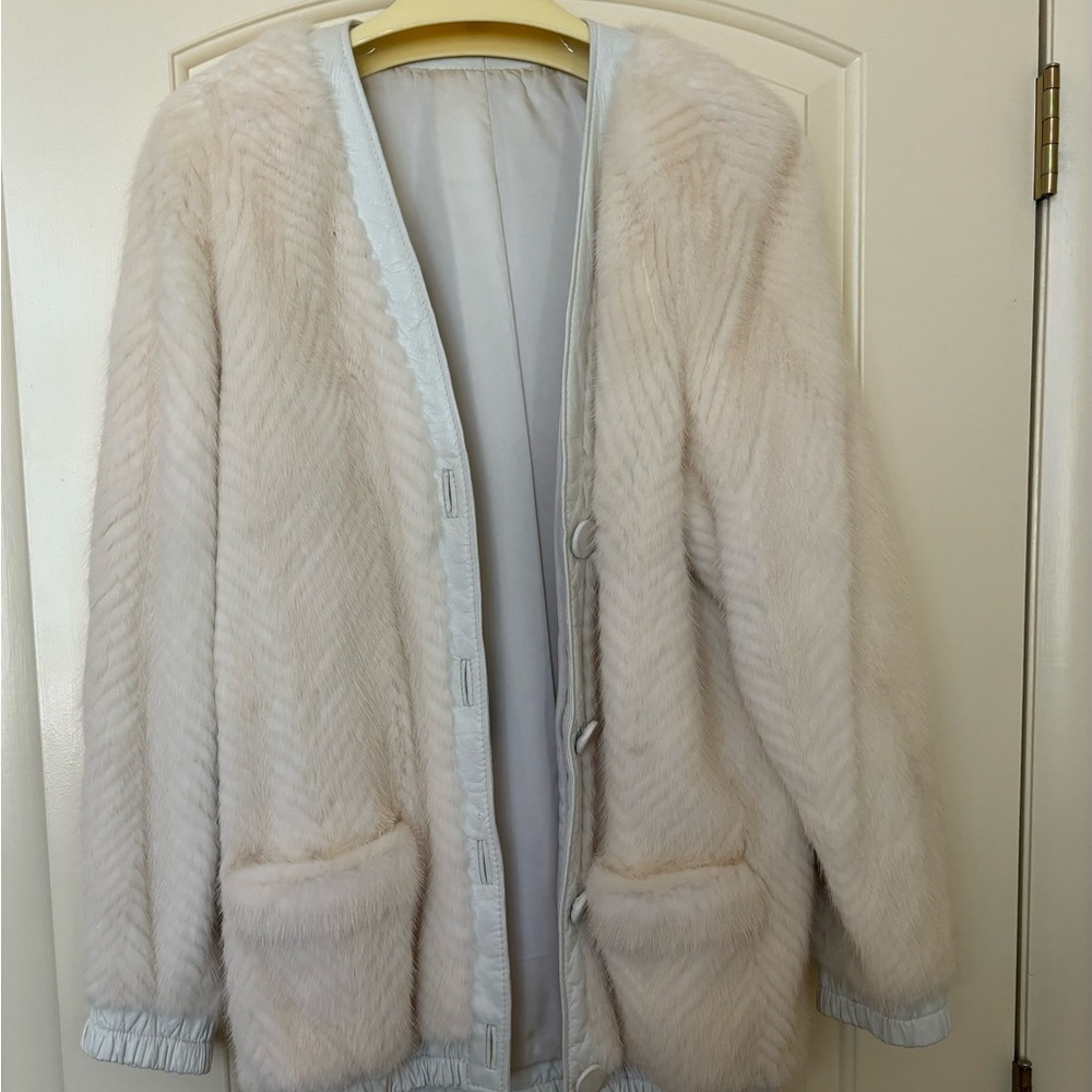 Mink jacket with leather trim and leather buttons